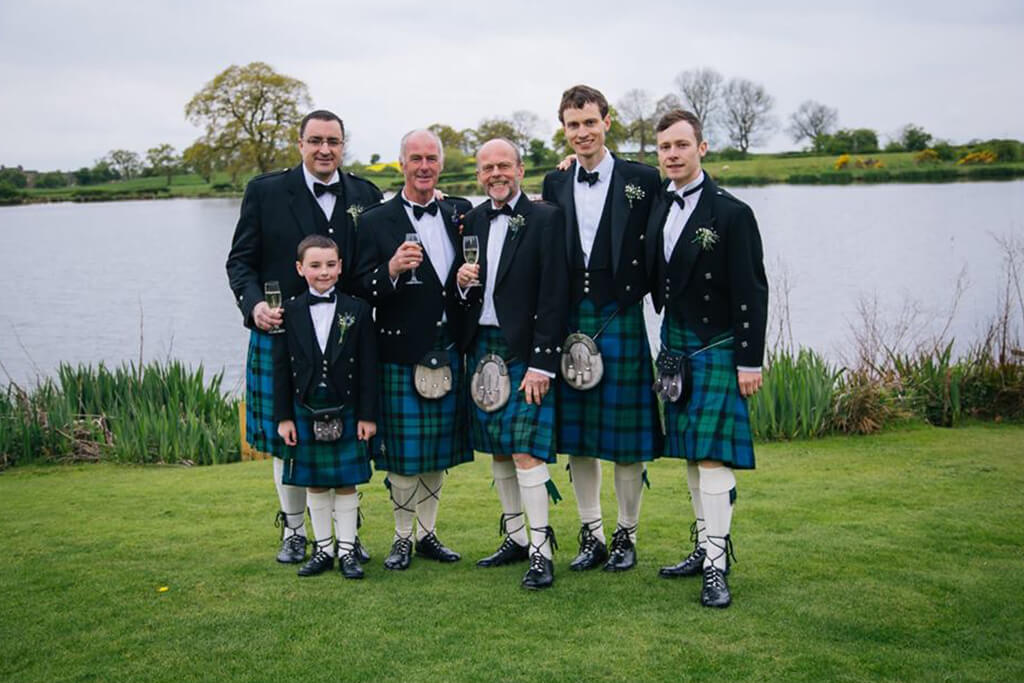The groomsmen all had a photo together tin their blue tartan kilts – wedding ideas