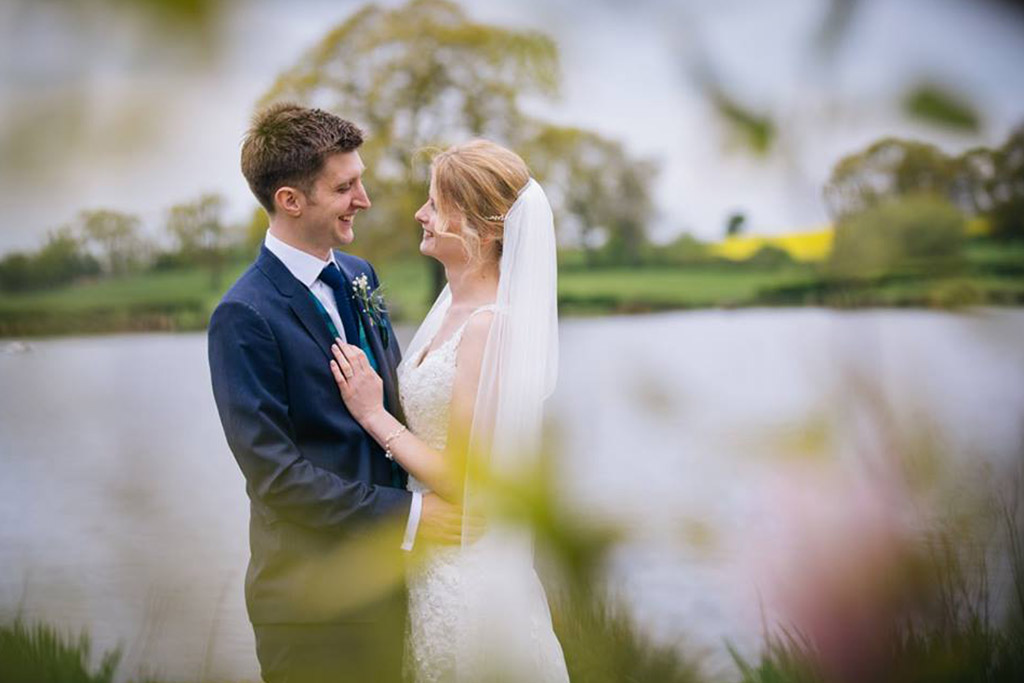 The bride and groom steal a moment away from guests at one of the finest wedding venues in Cheshire