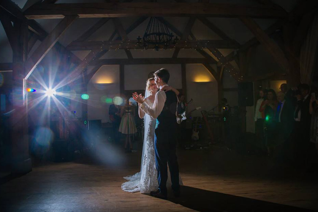 The excited newlyweds take to the dance floor to enjoy their first dance as husband and wife