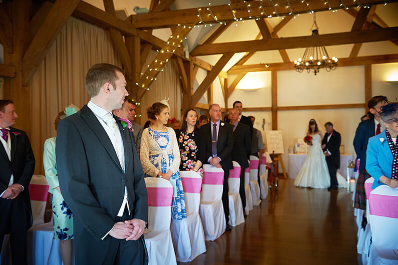 Tracy and her dad walking down the aisle