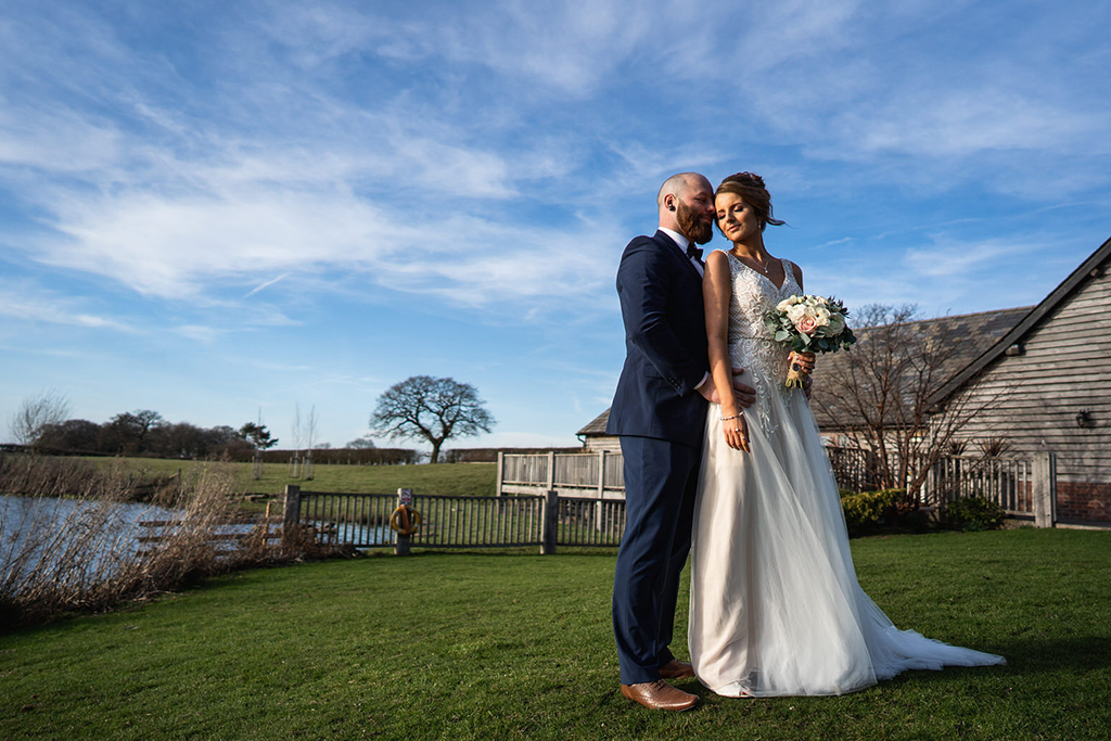 The bride prepares for the day ahead at her wedding at Sandhole Oak Barn
