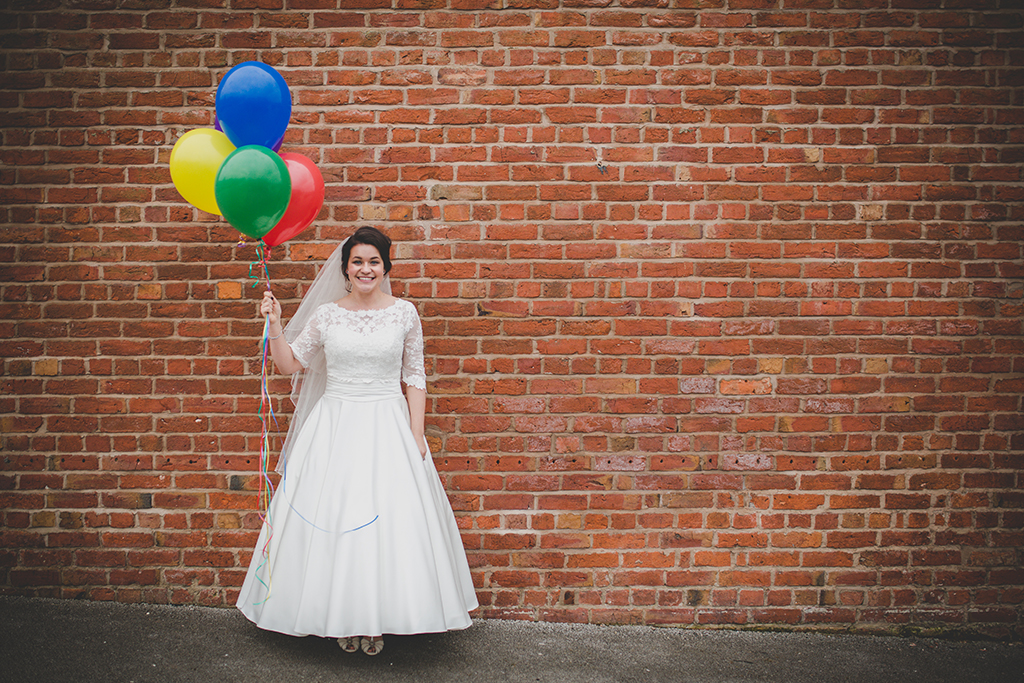 The bride wore a pretty lace top dress with 50’s style skirt for her spring wedding at Sandhole Oak Barn near Manchester