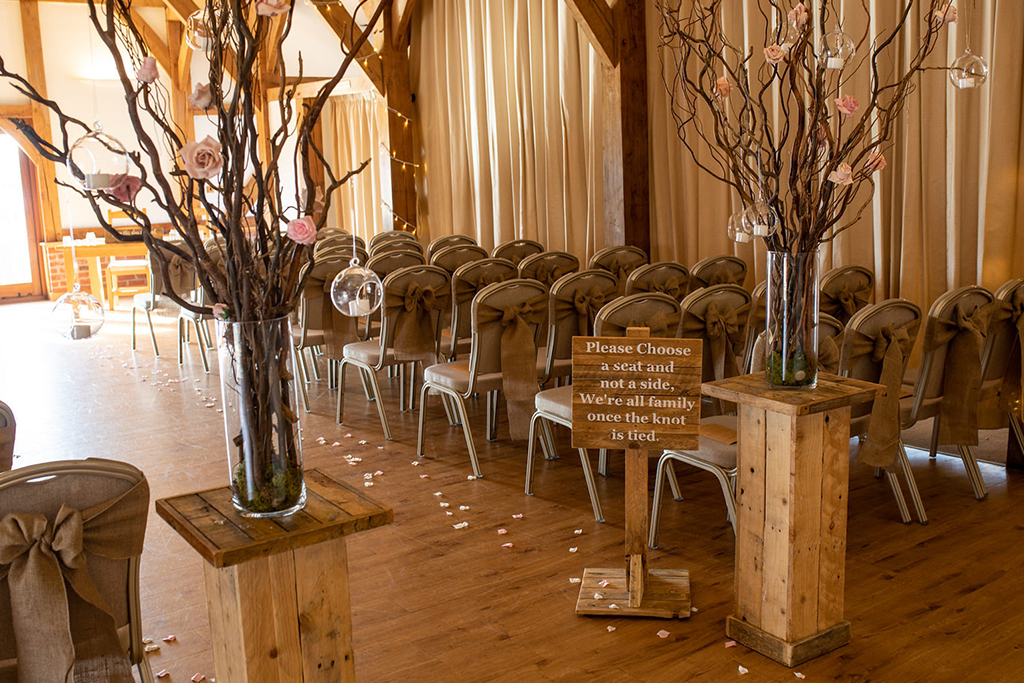 The oak barn was set up for the wedding ceremony at Sandhole Oak Barn in Cheshire