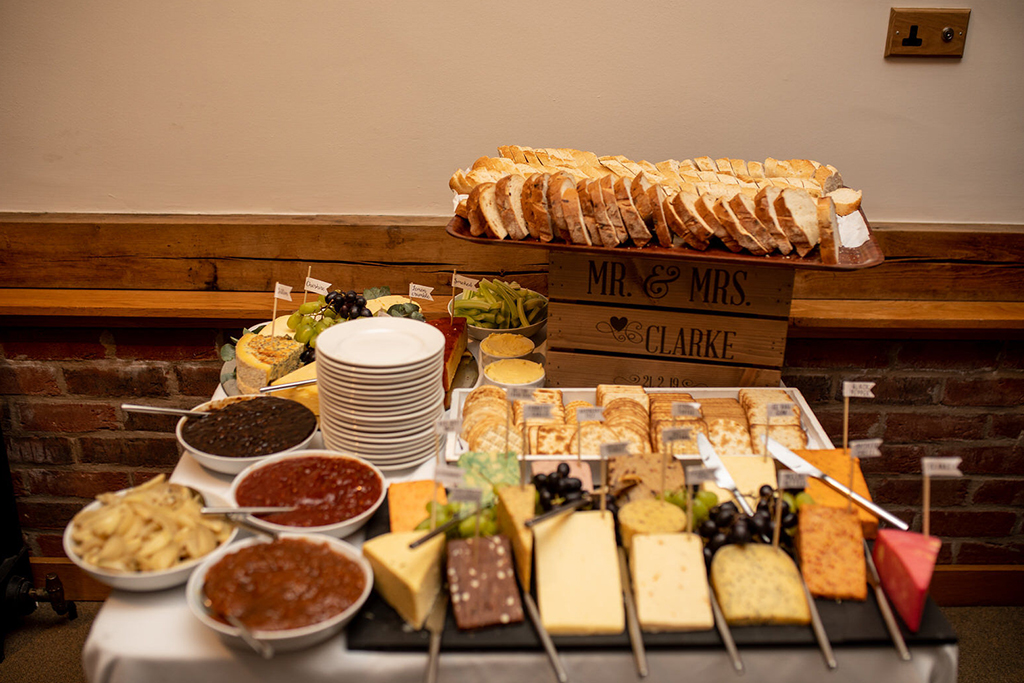 A delicious cheese table was put on for wedding evening guests at Sandhole Oak Barn 