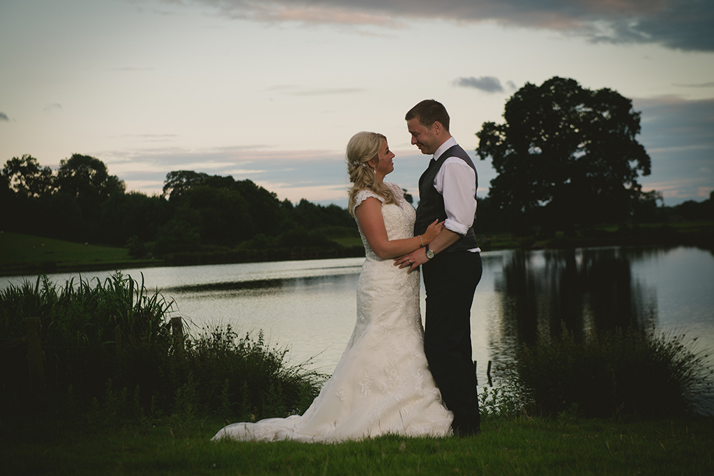 The happy couple take time at the end of the day to reflect on their special wedding day at Sandhole Oak Barn