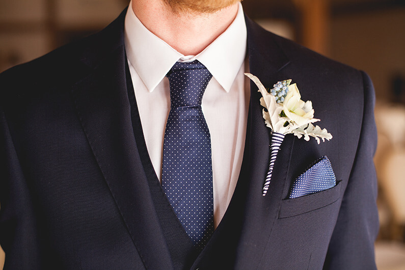 Danny's blue suit and cream & blue buttonhole