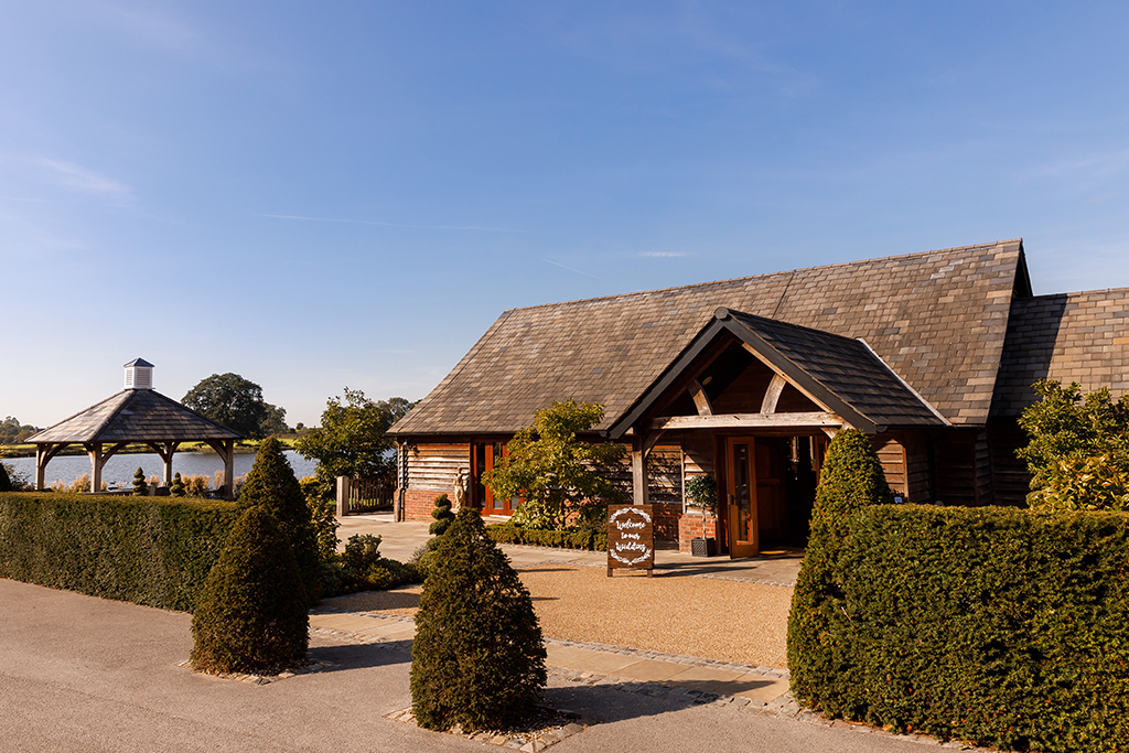 Sandhole Oak Barn with its rustic exterior and beautiful surroundings is perfect for a summer wedding