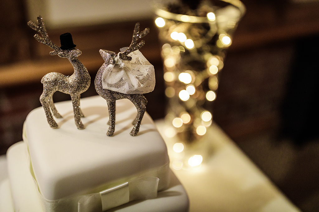 Pop a festive topper on your wedding cake for that winter wonderland feel at your wedding at Sandhole Oak Barn