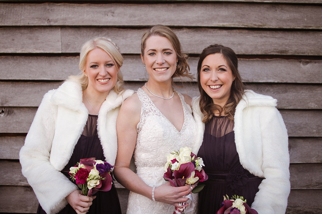 The bride and bridesmaids at Kirsty and Richard's wedding at Sandhole Oak Barn