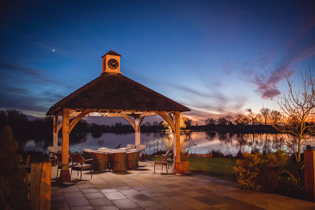 The beautiful Clock Tower at dusk at Sandhole Oak Barn