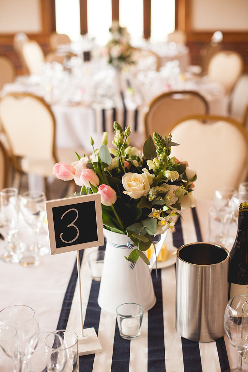 pink, cream and blue pastel flowers table centrepiece
