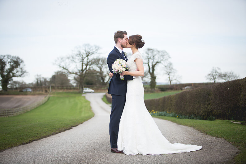 Lauren and Danny in the beautiful grounds at Sandhole Oak Barn