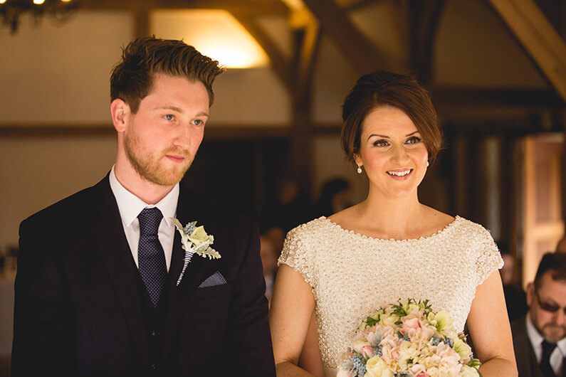 Lauren and Danny's ceremony in the rustic barn