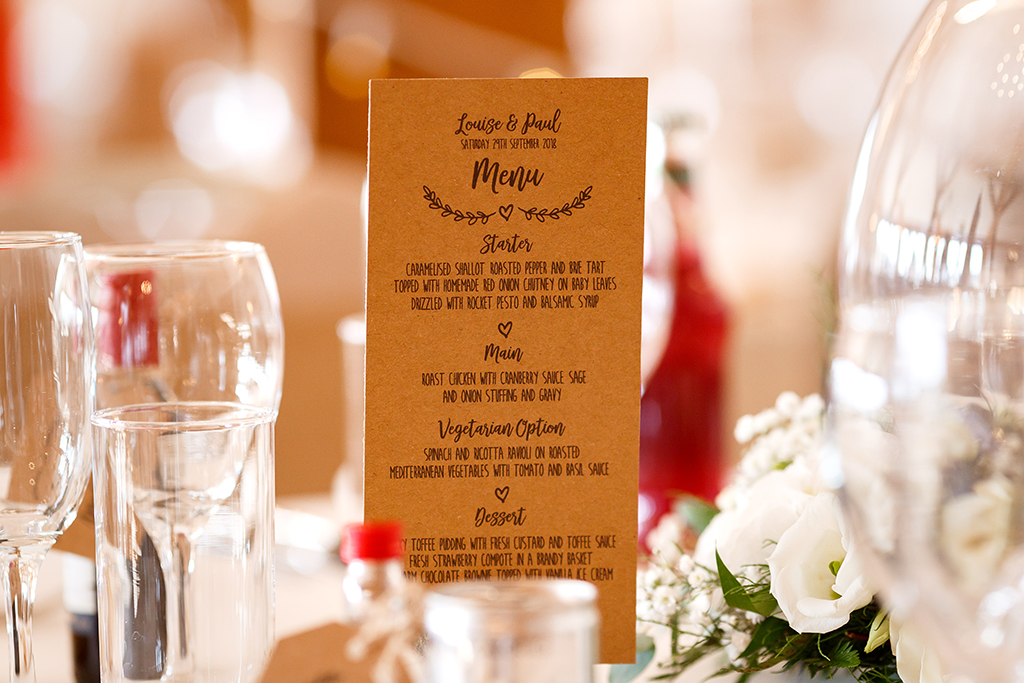 The wedding menus were printed on natural card at this rustic barn wedding in Cheshire