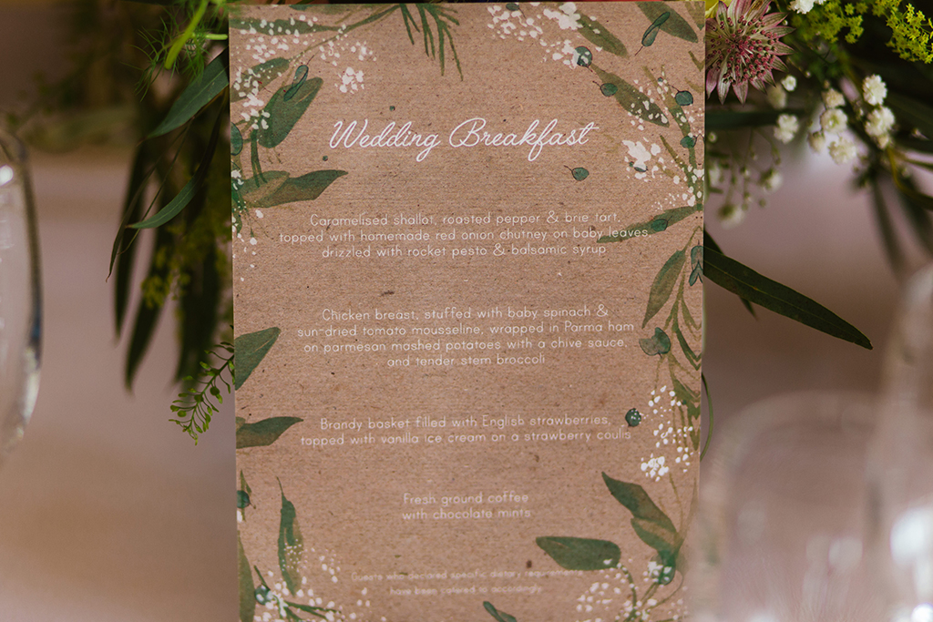 The wedding menus were printed on pretty rustic card at this summer barn wedding in Cheshire
