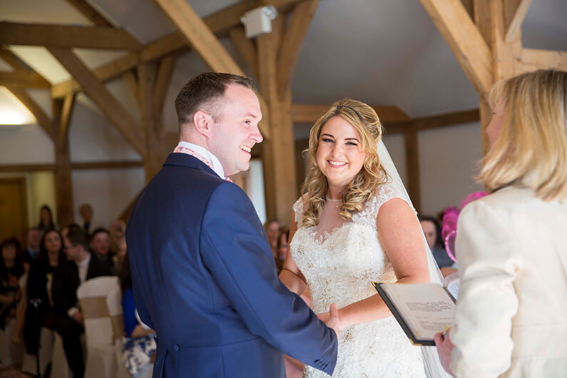 Micaela and Garry exchanging vows