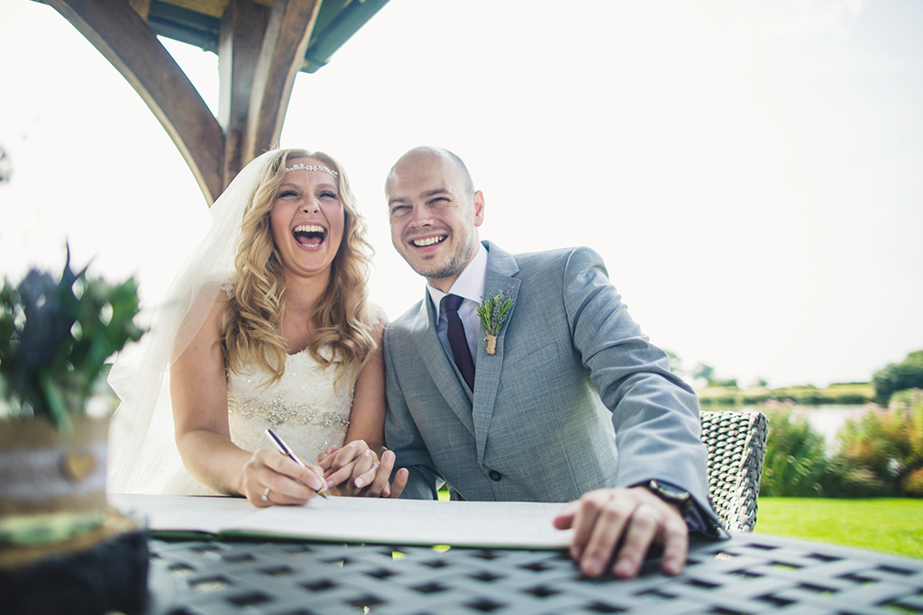 Sandhole Oak Barn in Cheshire is the perfect outdoor wedding venue with stunning venues over the lake