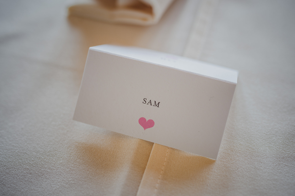 The couple chose simple yet elegant handmade made place cards for their barn wedding in Cheshire