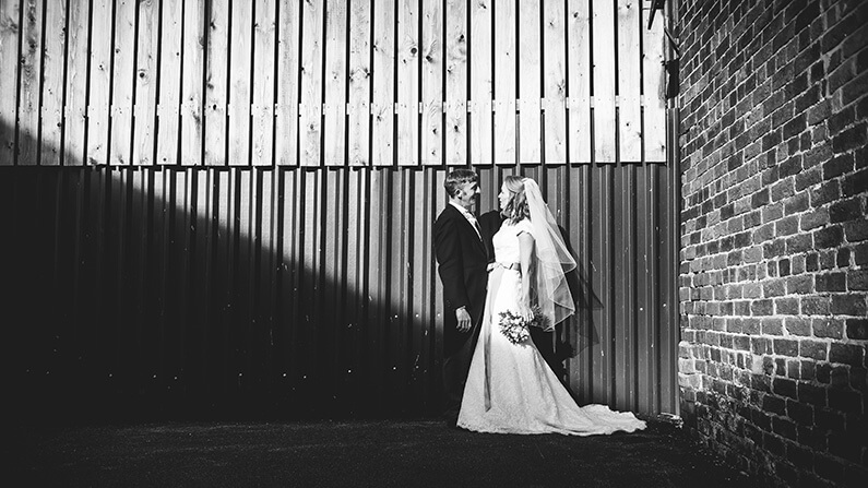 Rachel and Norman outside the barn