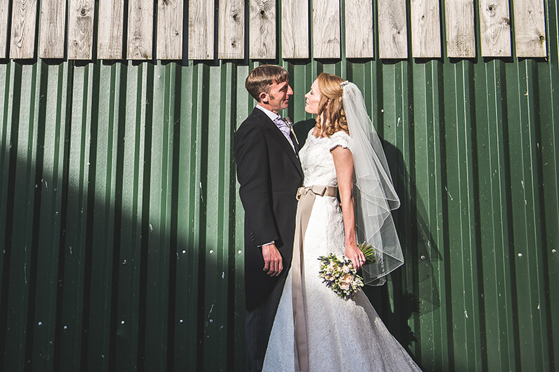 Rachel and Norman outside the green barn