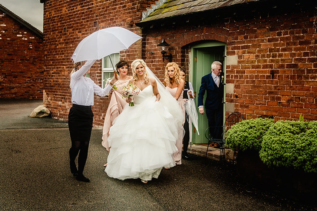 Pretty lace wedding dress at Rebecca and Graeme's wedding at Sandhole Oak Barn