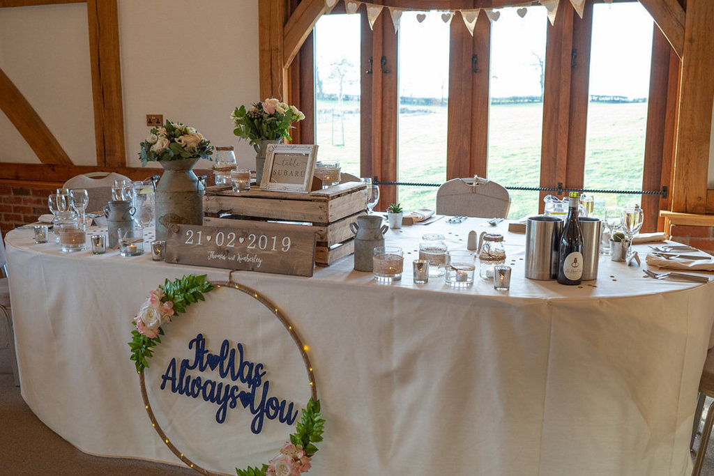 The top table was decorated with rustic items at Sandhole Oak Barn