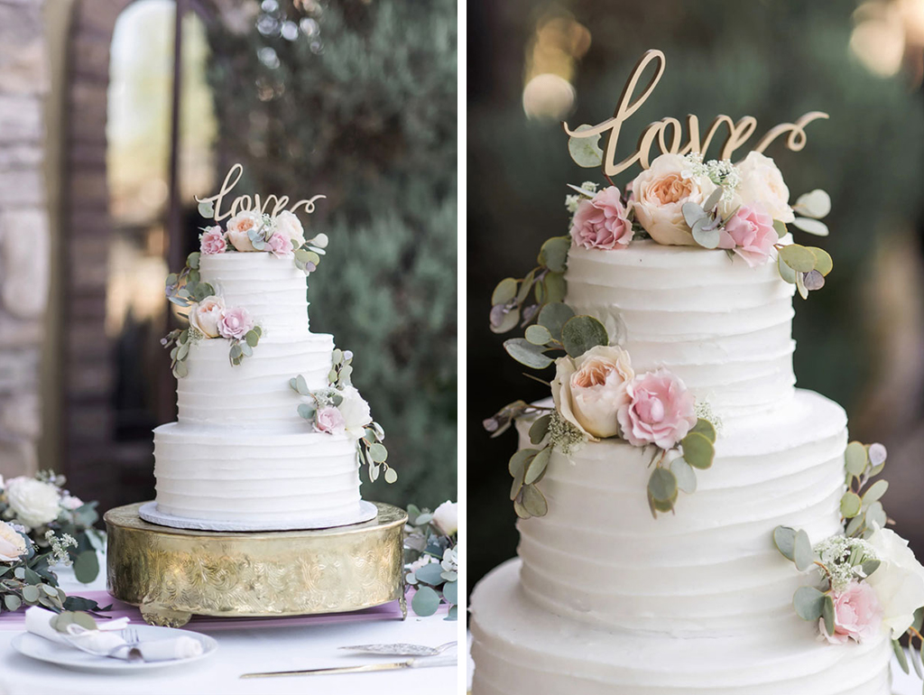 This elegant three-tiered white iced wedding cake is perfect for a summer wedding